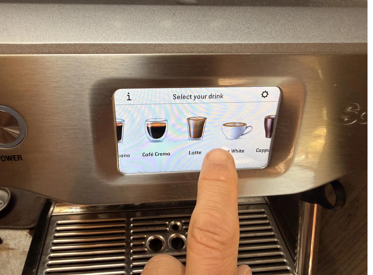 Select your drink on the touchscreen