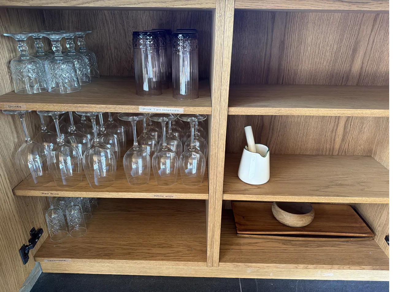 Glassware cupboard in The Nest kitchen island